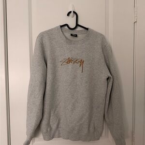 Stussy Gray Crewneck Sweater with Gold Logo